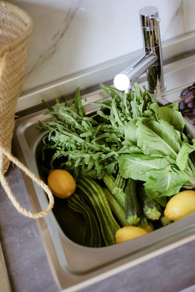 vegetables in a kitchen sink